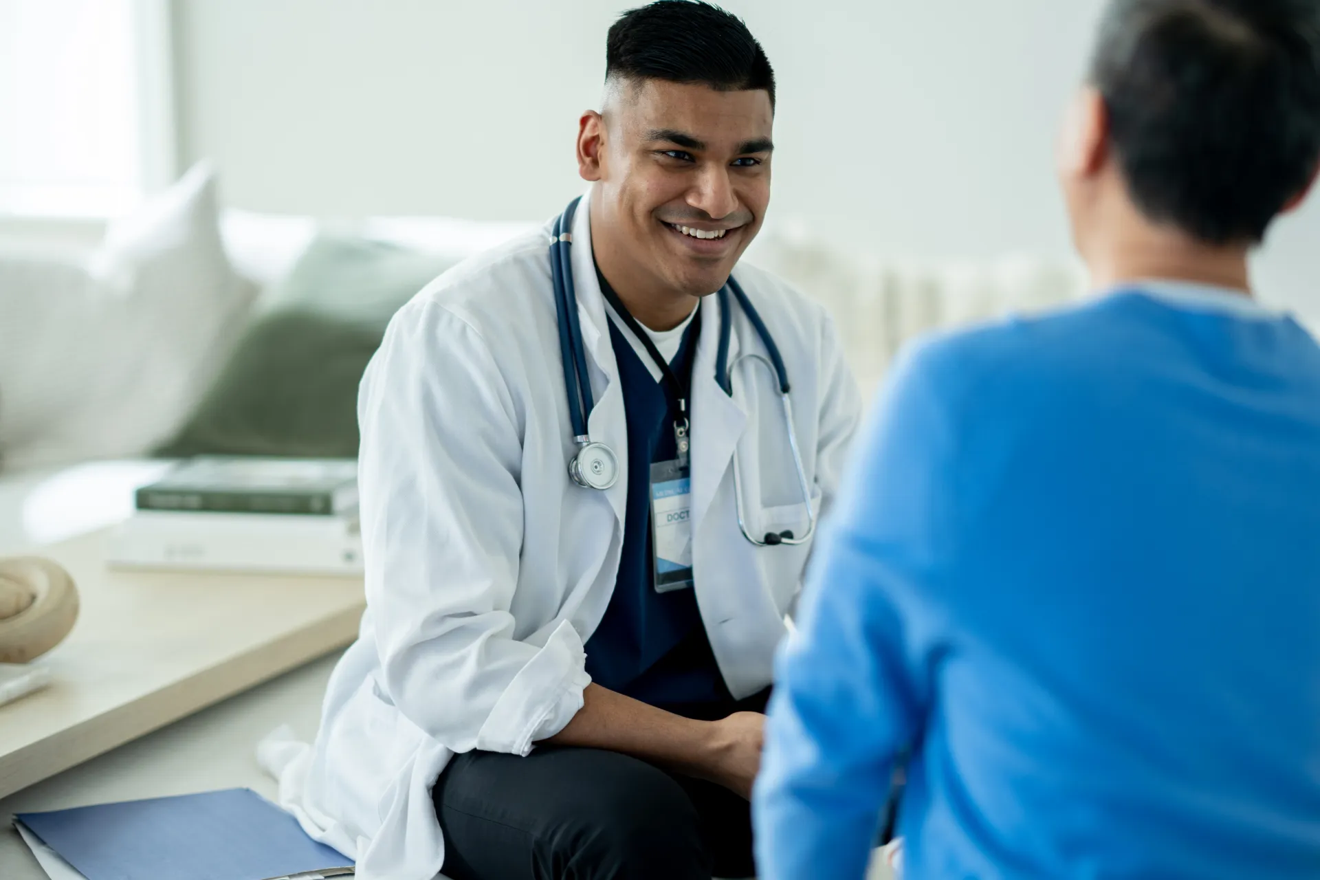 Healthcare marketing strategist consulting one-on-one with a practice owner